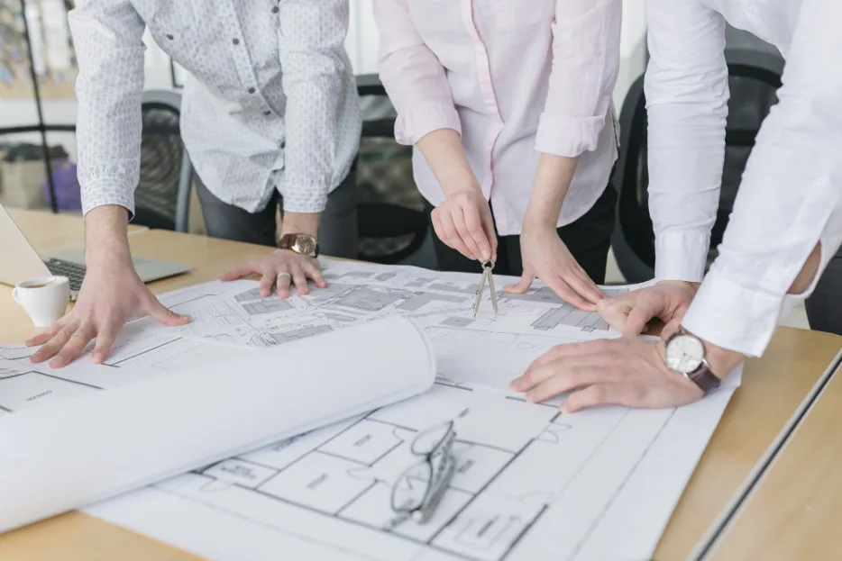 Advisors reviewing a property plan